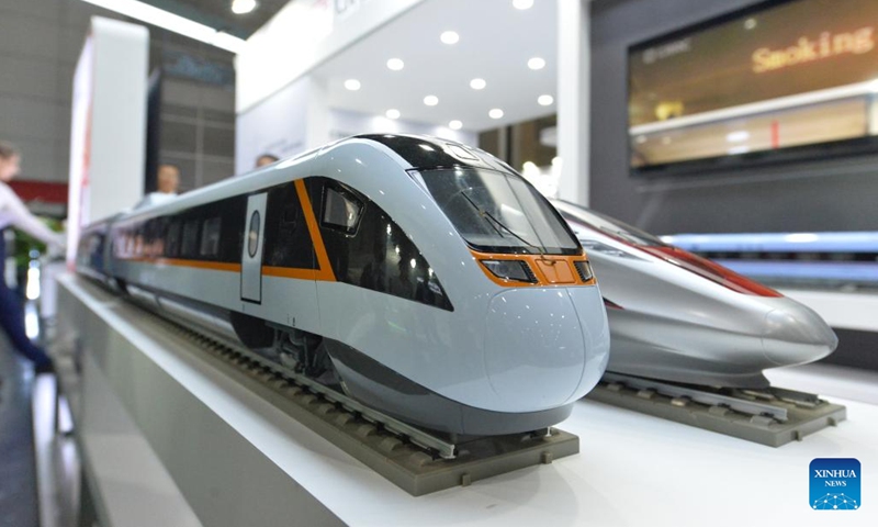 Train models of China Railway Rolling Stock Corporation (CRRC) are pictured during Asia Pacific Rail 2023 in Bangkok, Thailand, on May 31, 2023. CRRC held a series of activities themed on Discovering the world by train during the exhibition, displaying diverse models of Chinese-made trains.(Photo: Xinhua)