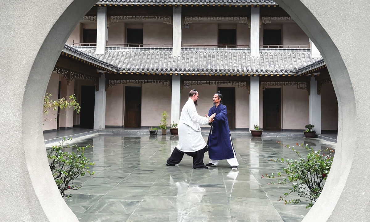 Jack Lee Pinnick (left) is practicing martial arts with his master at the Wudang Mountains. Photo: Courtesy of Pinnick