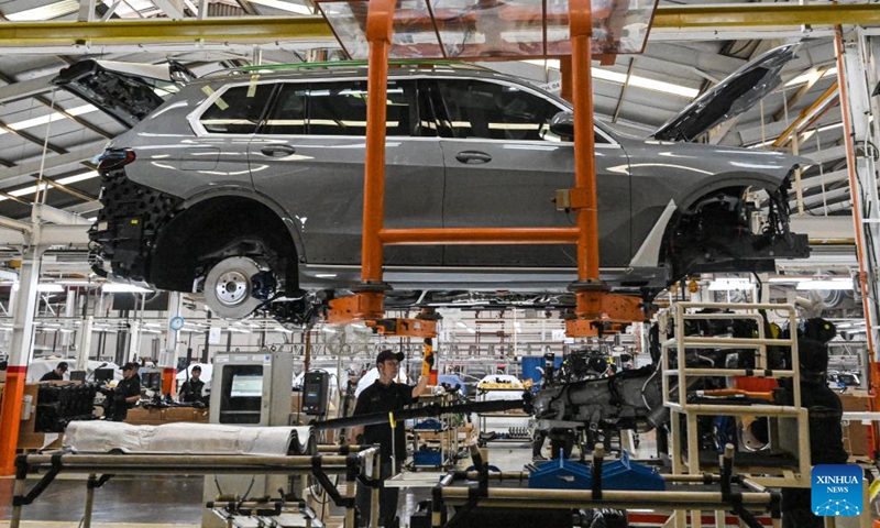 Workers assemble a BMW car at Gaya Motor Plant in Jakarta, Indonesia, June 6, 2023.(Photo: Xinhua)