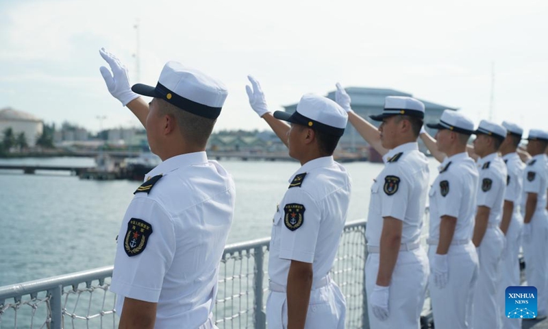 The Chinese naval members wave to the welcoming crowds at Muara Port in Brunei, June 5, 2023(Photo: Xinhua)