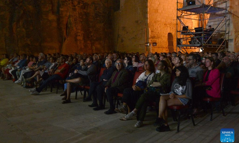 People watch a film during the Cinema City event in Valletta, Malta, on June 7, 2023. The six-day Cinema City event featuring outdoor film screenings kicked off here on Wednesday.(Photo: Xinhua)