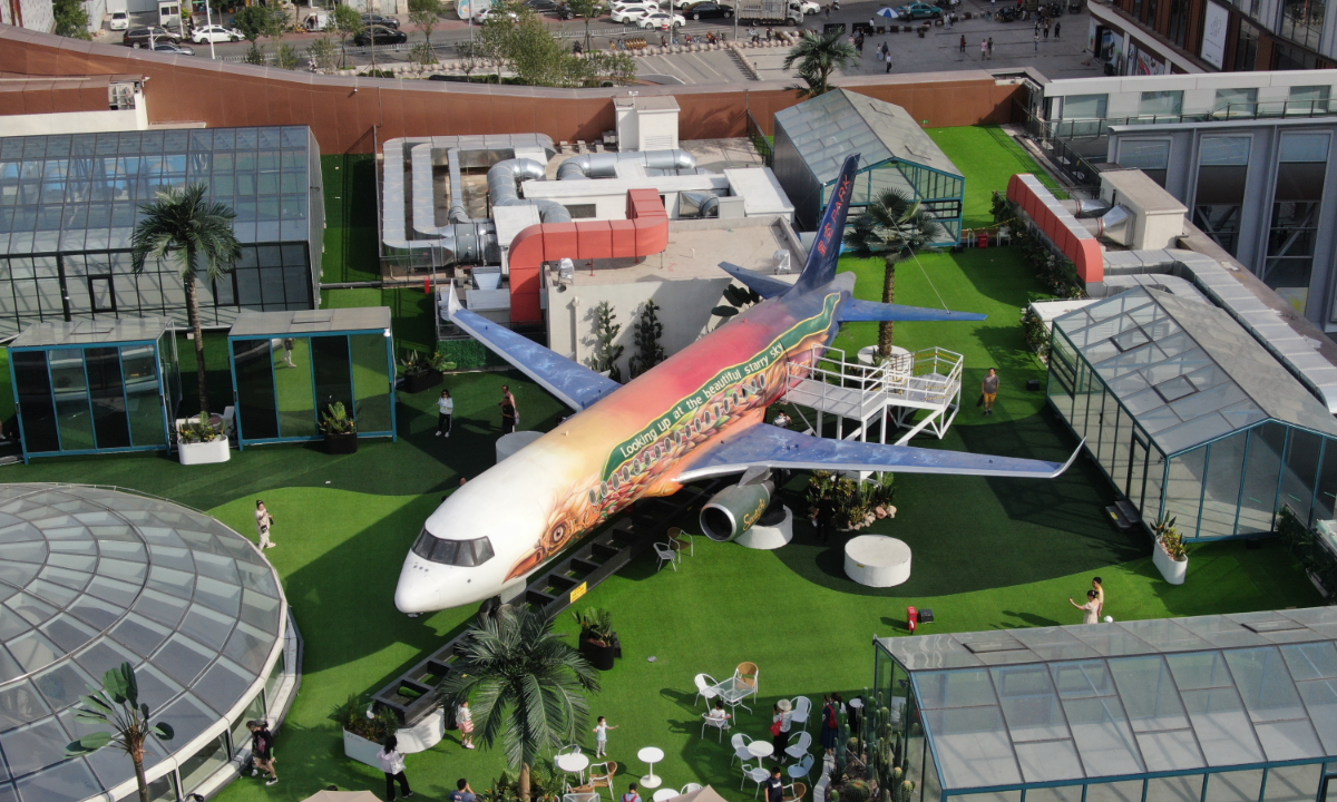 A giant “plane” placed on the roof of a shopping mall in North China’s Tianjin is used as a restaurant, and many tourists come to take photos on June 3, 2023. Photo: IC