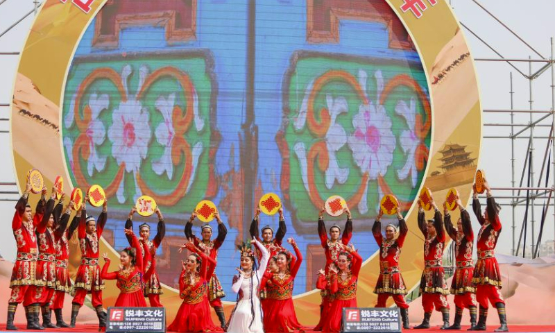 Danceers perform at the opening ceremony of the Qiuci culture and tourism festival in Kuqa City of Aksu Prefecture, northwest China's Xinjiang Uygur Autonomous Region, June 17, 2023. The Qiuci culture tourism festival kicked off here on Saturday. (Xinhua/Hao Zhao)