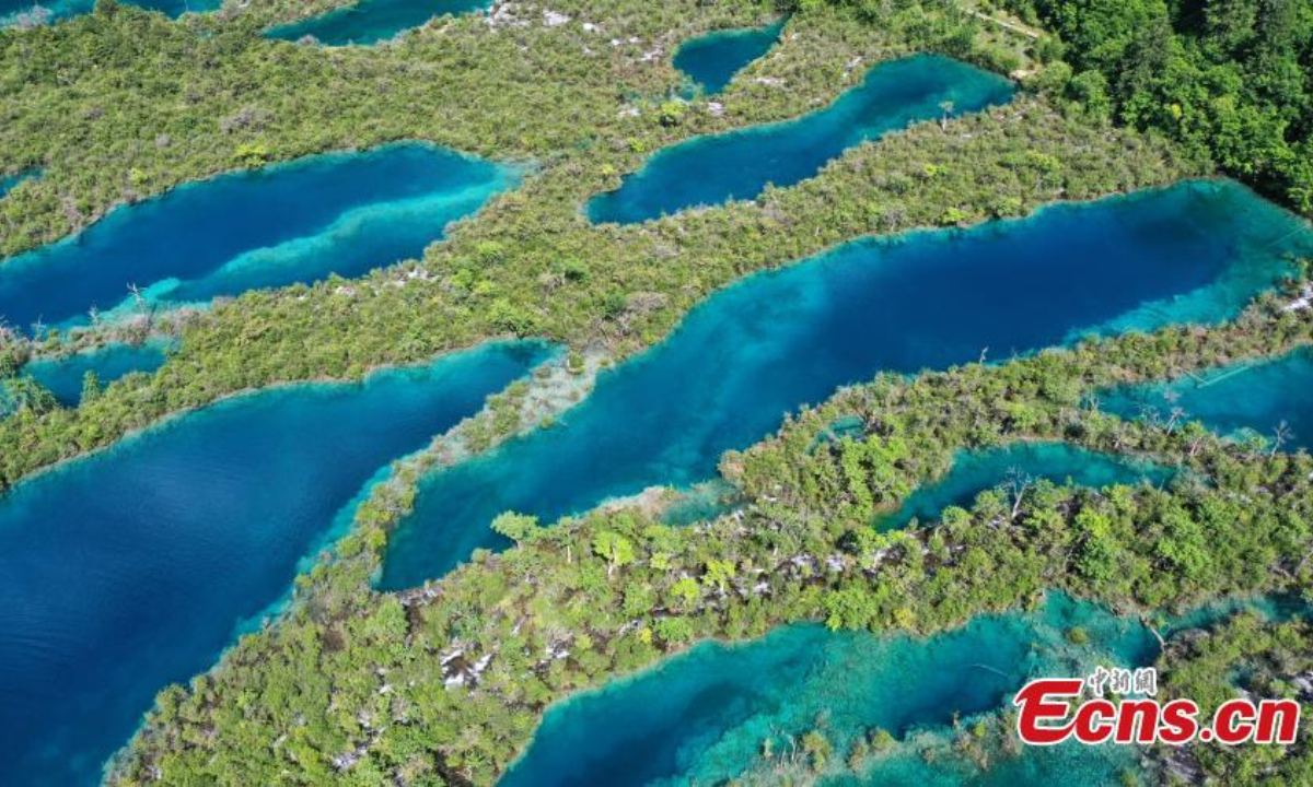 Spectacular summer scenery in Jiuzhaigou National Park, a UNESCO World Heritage site in southwest China's Sichuan Province, June 8, 2023. Waterfalls, lush forests and serene plateau lakes attract many tourists. Photo: China News Service