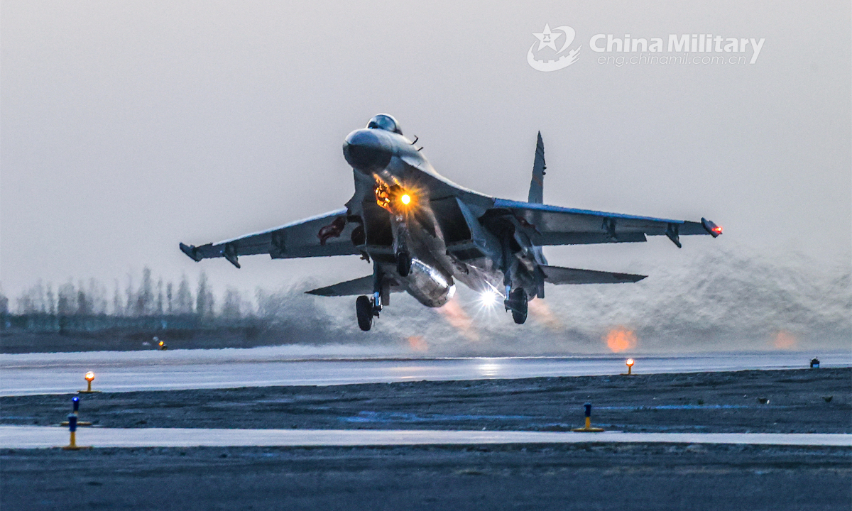 A fighter jet attached to a brigade under the PLA Air Force Xi'an Flying College takes off for a round-the-clock training mission in early June, 2023. Photo: China Military