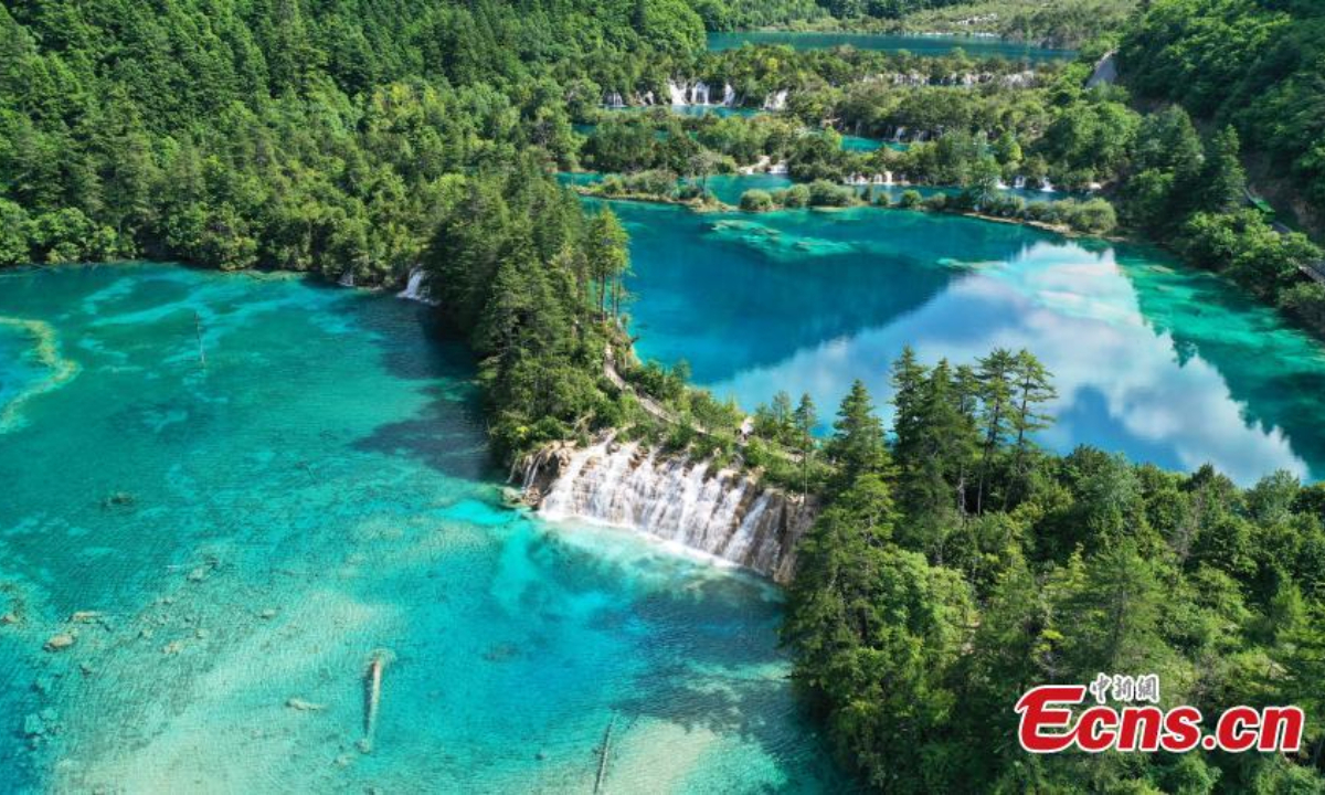 Spectacular summer scenery in Jiuzhaigou National Park, a UNESCO World Heritage site in southwest China's Sichuan Province, June 8, 2023. Waterfalls, lush forests and serene plateau lakes attract many tourists. Photo: China News Service