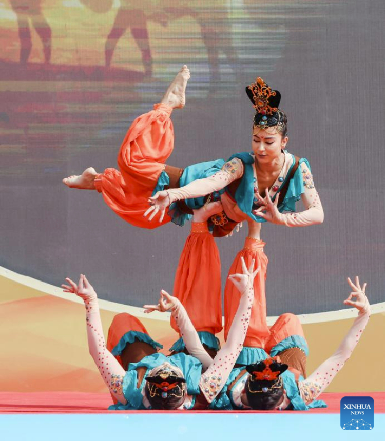 Danceers perform at the opening ceremony of the Qiuci culture and tourism festival in Kuqa City of Aksu Prefecture, northwest China's Xinjiang Uygur Autonomous Region, June 17, 2023. The Qiuci culture tourism festival kicked off here on Saturday. (Xinhua/Hao Zhao)