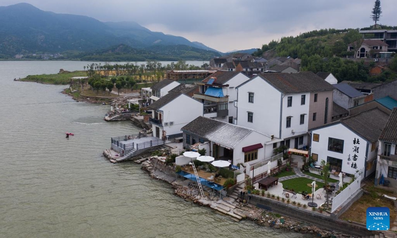 This aerial photo taken on June 12, 2023 shows a view of Shuanghu Village in Cixi City, east China's Zhejiang Province. Cixi City has been promoting rural revitalization for years. The living environment and life quality of locals have been significantly improved, and the ecological environment of rural areas has also been optimized.(Photo: Xinhua)