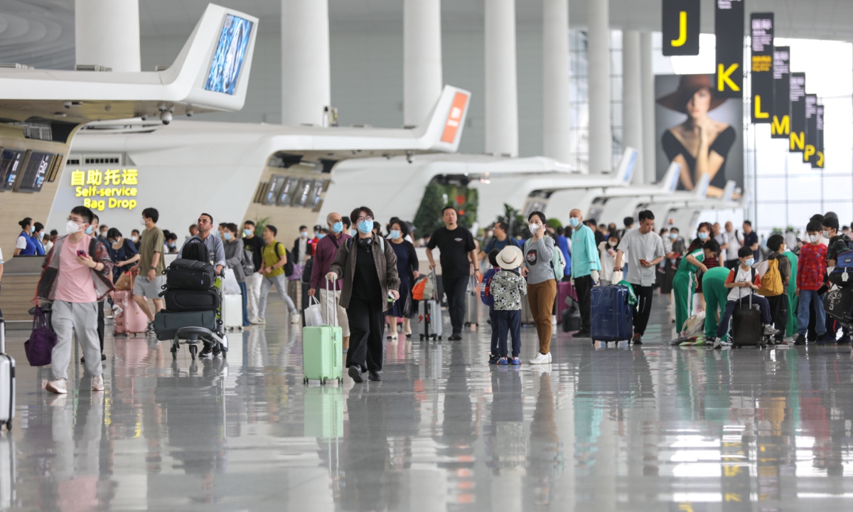 Passengers wait at Guangzhou Baiyun International Airport on April 29, 2023, the first day of the five-day May Day holidays. Photo: Courtesy of Guangzhou Baiyun International Airport