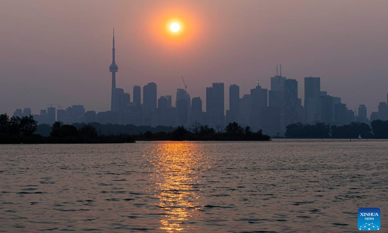 Wildfire smoke shrouds Toronto, Canada, on June 6, 2023. Environment Canada issued a special air quality statement for Toronto on Tuesday after the smoke from forest fires in Quebec and northeastern Ontario arrived in Toronto. Poor air quality may persist through most of this week.(Photo: Xinhua)