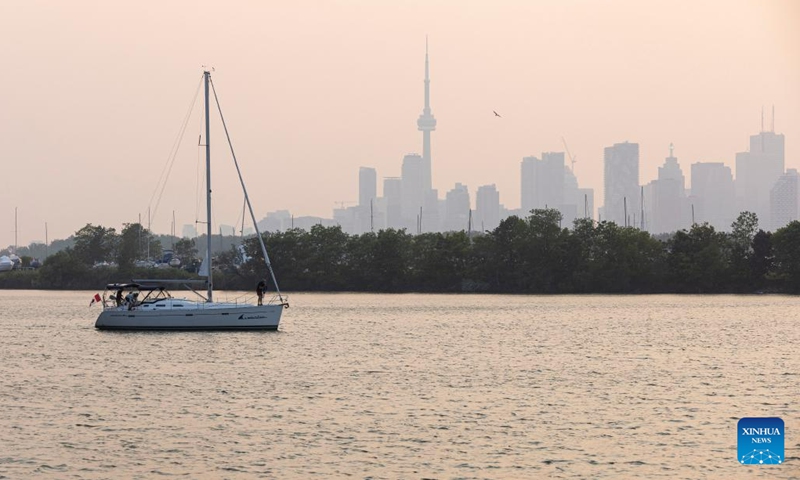 Wildfire smoke shrouds Toronto, Canada, on June 6, 2023. Environment Canada issued a special air quality statement for Toronto on Tuesday after the smoke from forest fires in Quebec and northeastern Ontario arrived in Toronto. Poor air quality may persist through most of this week.(Photo: Xinhua)