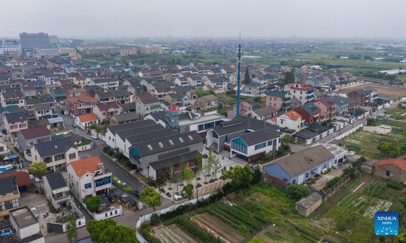 This aerial photo taken on June 13, 2023 shows a view of Wan'anzhuang Village in Cixi City, east China's Zhejiang Province. Cixi City has been promoting rural revitalization for years. The living environment and life quality of locals have been significantly improved, and the ecological environment of rural areas has also been optimized.(Photo: Xinhua)