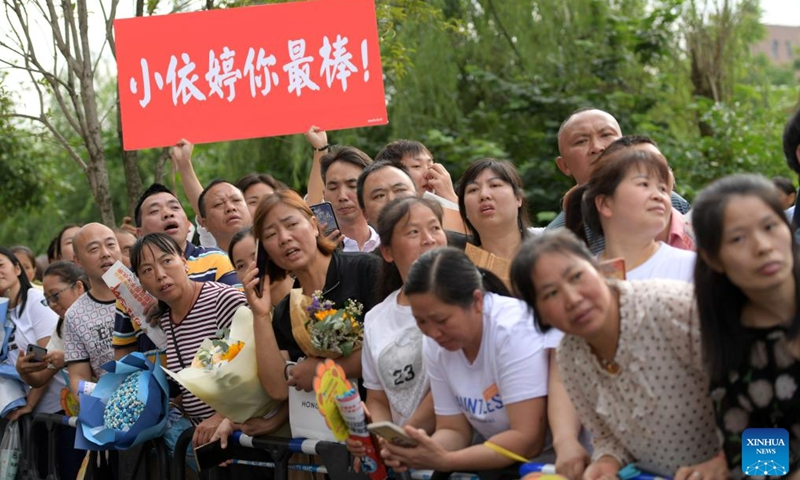 Relatives of examinees wait outside an exam site in Suiyang County, southwest China's Guizhou Province, June 8, 2023. China's annual college entrance exam concluded on Thursday in some parts of the country. The exam, also known as the gaokao, saw a record 12.91 million candidates sign up this year.(Photo: Xinhua)