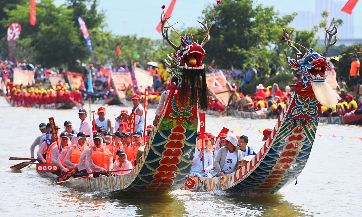 People take part in a dragon boat race in Putian, East China's Fujian Province on June 12, 2023, before the arrival of the Dragon Boat Festival (also known as the Duanwu Festival), which falls on the fifth day of the fifth lunar month (June 22 in 2023). The Putian dragon boat race has a long history and has been held since the Song Dynasty (960-1279). Photo: VCG