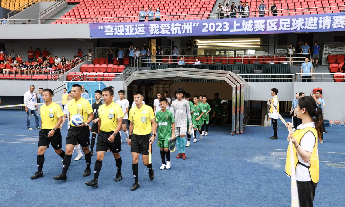 One of the main football venues for the Asian Games, located in Shangcheng district, Hangzhou, holds a soccer match on June 13, 2023 to test the operation and all-round security of the venue. Photo: IC