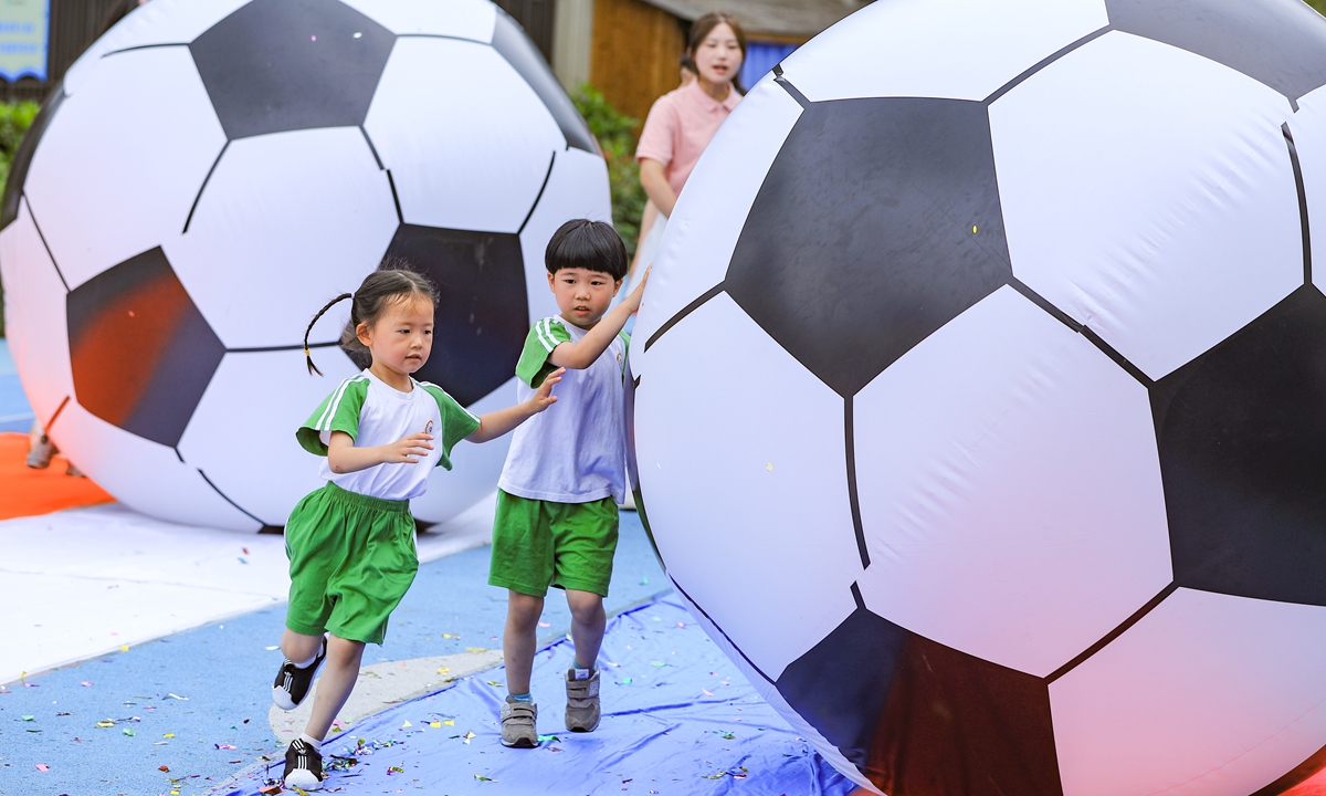 Kids participate in an Asian Games-themed  activity in Hangzhou on June 13, 2023. Photo: IC