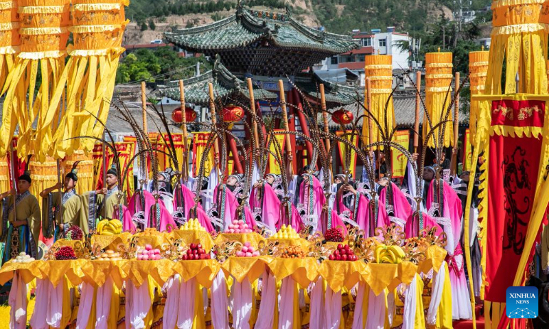 This photo taken on June 22, 2023 shows a worshipping dance performance during a commemoration ceremony of Fuxi, the Legendary ancestor of the Chinese nation, in Tianshui, northwest China's Gansu Province. (Xinhua/Lang Bingbing)