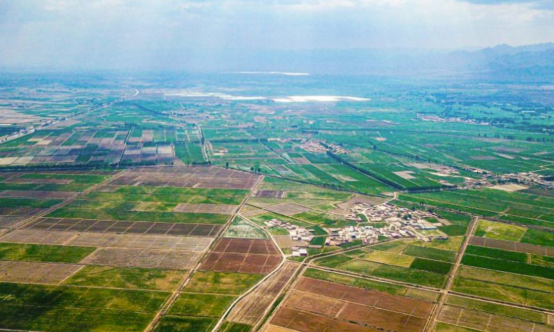 This aerial photo taken on June 17, 2023 shows the wheat fields in Bayannur, north China's Inner Mongolia Autonomous Region. (Xinhua/Peng Yuan)