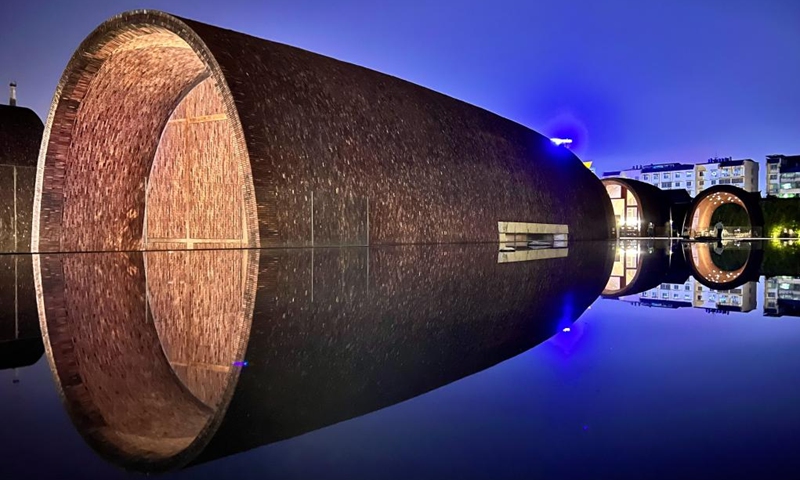 This photo taken on May 15, 2023 shows a night view of Jingdezhen Imperial Kiln Institute in Jingdezhen, east China's Jiangxi Province. Jingdezhen is a world-famous porcelain capital in east China's Jiangxi Province. The city has four national-level industrial heritage sites. In the past few years, Jingdezhen has advanced the protection and utilization of industrial heritage, injecting new vitality to the city's development.(Photo: Xinhua)