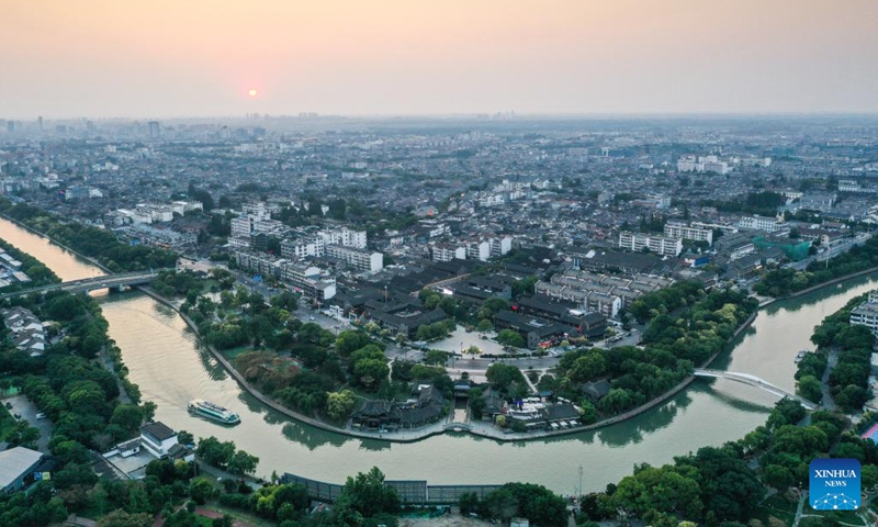 This aerial photo taken on June 14, 2023 shows a view of the Grand Canal in Yangzhou, east China's Jiangsu Province. China's Grand Canal, a vast waterway connecting the northern and southern parts of China, was listed as a UNESCO World Heritage Site in 2014. Yangzhou, a scenic city through which the Grand canal runs, has been known for canal-side attractions like Slender West Lake and Sanwan canal scenic area.(Photo: Xinhua)