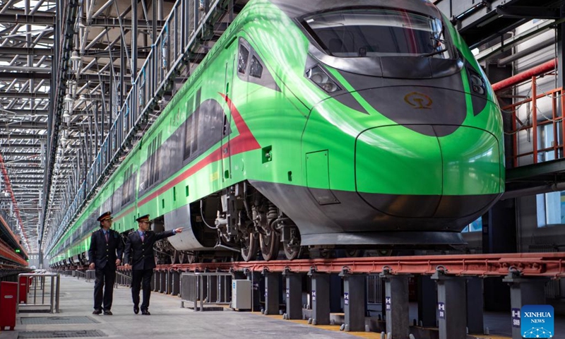 A Fuxing high-speed train is seen at a preparedness center in Lhasa, capital of southwest China's Tibet Autonomous Region, Jan. 11, 2023. Since the 7th century, the city of Lhasa gradually emerged in the heart of the plateau, nestled within the valley of the Lhasa River -- a tributary of the Yarlung Tsangpo River.(Photo: Xinhua)