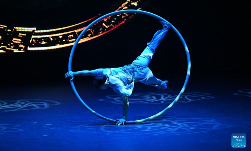 An actor performs acrobatics during the opening ceremony of China (Shandong) Kuwait Cultural and Tourism Year in Kuwait City, Kuwait, June 21, 2023. Artists from Shandong Province, eastern China, gave a dazzling performance for the Kuwaiti audience on Wednesday during the opening ceremony of the China (Shandong) Kuwait Cultural and Tourism Year. (Photo by Asad/Xinhua)