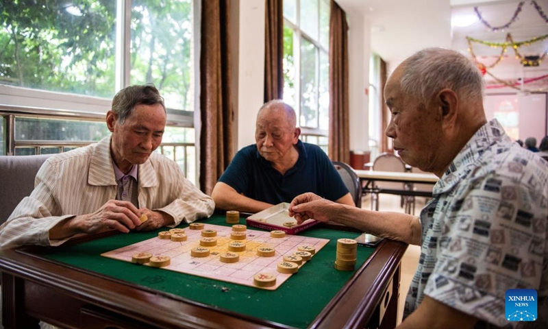 Senior residents play chess at a social welfare center in Hanshou County of Changde City, central China's Hunan Province, June 20, 2023.The city of Changde has scaled up efforts to develop an elderly care service system composed mainly of in-home cares, community services, institutional and medical cares. (Xinhua/Chen Sihan)