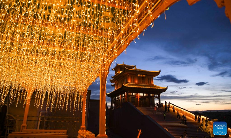 Tourists visit the ancient city of Kashgar scenic area in Kashgar, northwest China's Xinjiang Uygur Autonomous Region, June 14, 2023. (Xinhua/Hu Huhu)