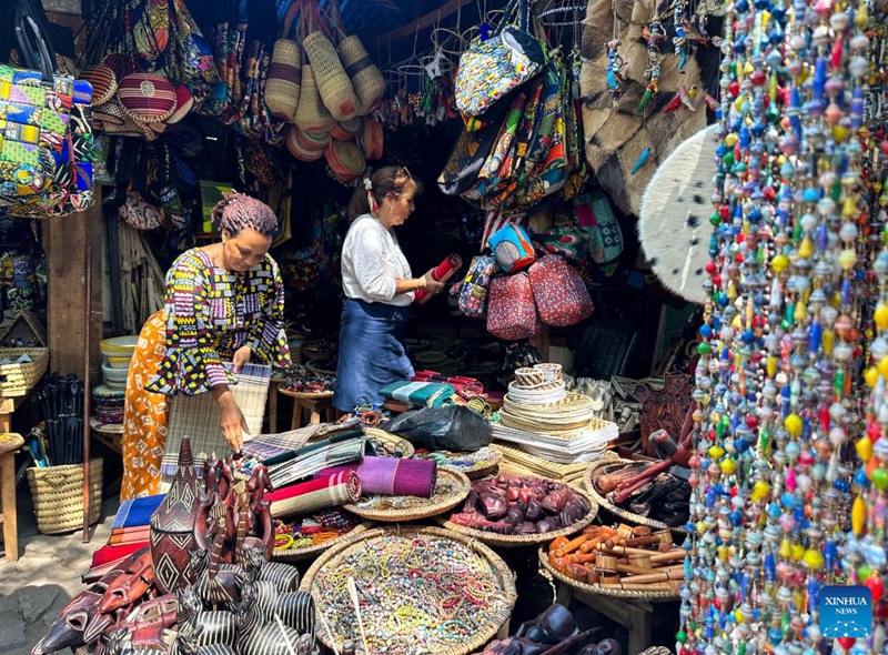 Customers visit a handicraft store in Bujumbura, Burundi, June 22, 2023. Bujumbura is economic capital, the largest city and main port of Burundi. (Xinhua/Han Xu)