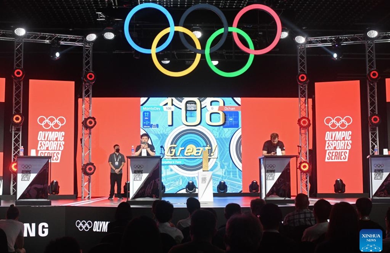 Jared Montgomery (R) of the United States competes during the archery event at the Olympic ESports Week 2023 held in Singapore on June 23, 2023. (Photo by Then Chih Wey/Xinhua)