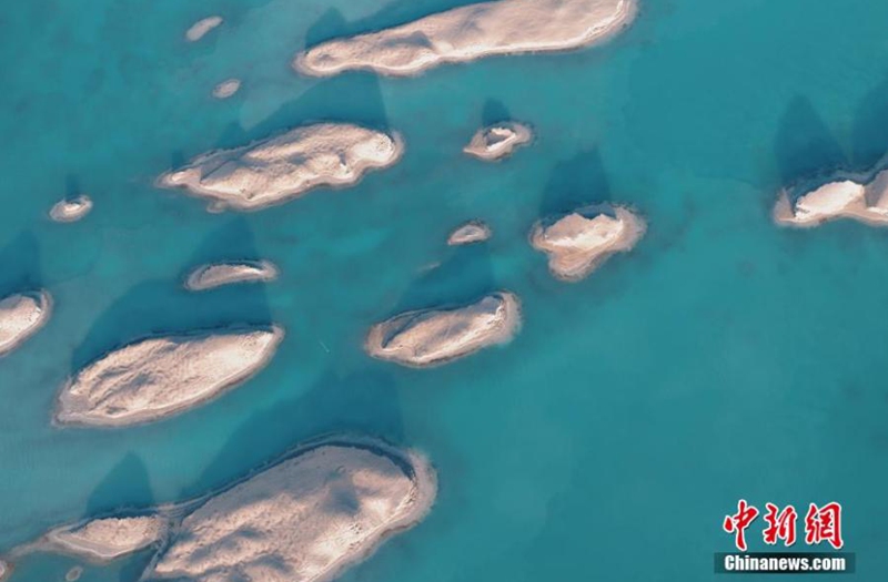 Yardang rocks at the sunrise in the Wusute Yadan Geological Park in Qaidam Basin, Haixi Mongolian and Tibetan Autonomous Prefecture, northwest China's Qinghai Province, June 24, 2023. (Photo: China News Service/Zou Xiaoqing)

