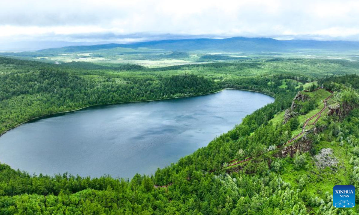 This aerial photo taken on July 6, 2023 shows tourists enjoying themselves at the Arxan National Forest Park in Arxan of Hinggan League, north China's Inner Mongolia Autonomous Region. Photo:Xinhua