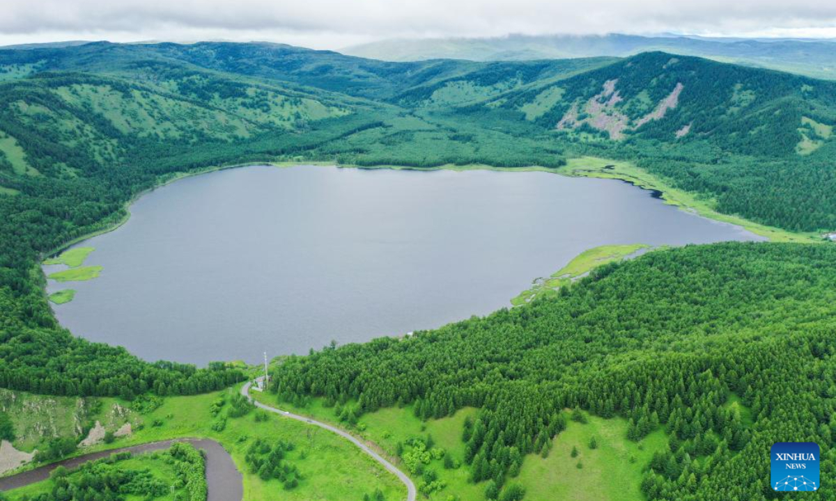 This aerial photo taken on July 6, 2023 shows tourists enjoying themselves at the Arxan National Forest Park in Arxan of Hinggan League, north China's Inner Mongolia Autonomous Region. Photo:Xinhua