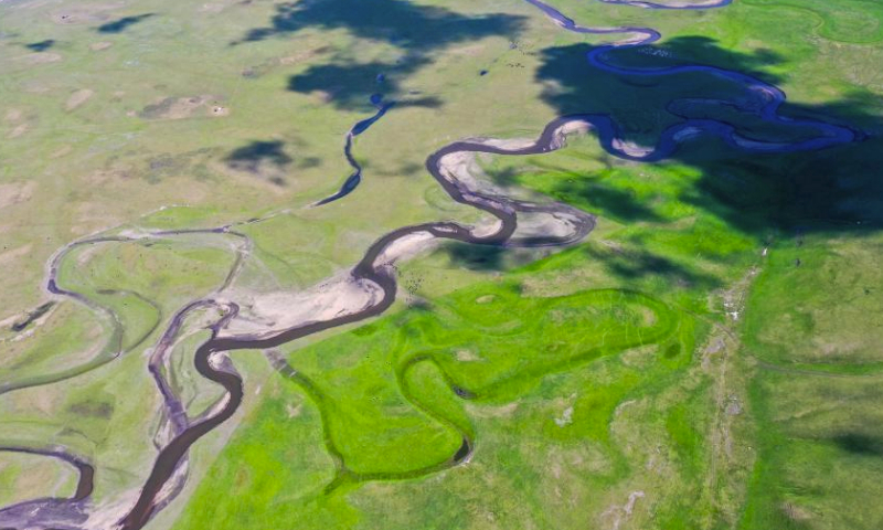 This aerial photo taken on July 1, 2023 shows scenery along the Mergel Gol River in Hulun Buir, north China's Inner Mongolia Autonomous Region. (Xinhua/Lian Zhen)