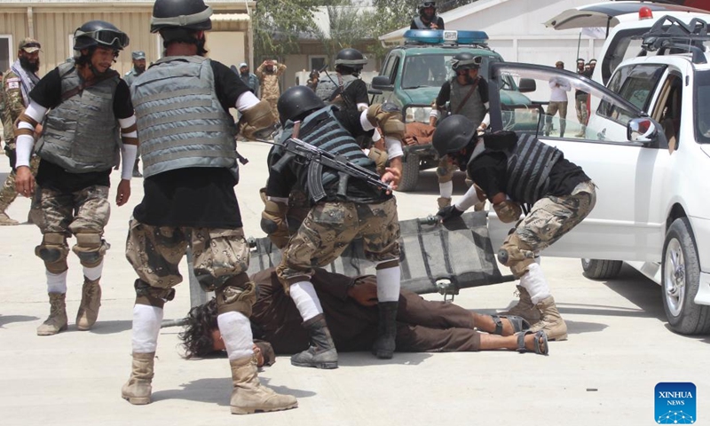 Police cadets show their skills during their graduation ceremony in Nangarhar Province, Afghanistan, June 24, 2023. A total of 430 newly graduated cadets have joined Afghanistan's national police force after completing a two-month training course in the eastern Nangarhar province, Qari Basharmal Bashardost, National Police Academy commander in the east, said Saturday.(Photo: Xinhua)