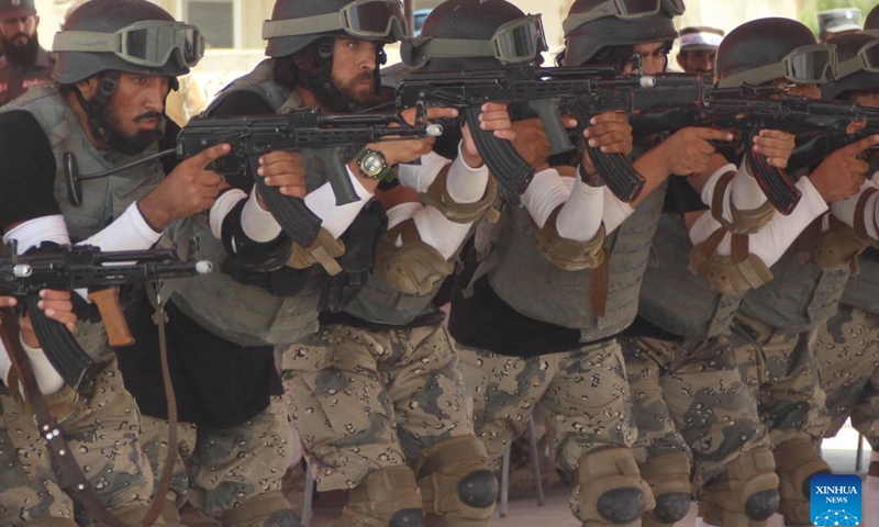 Police cadets show their skills during their graduation ceremony in Nangarhar Province, Afghanistan, June 24, 2023. A total of 430 newly graduated cadets have joined Afghanistan's national police force after completing a two-month training course in the eastern Nangarhar province, Qari Basharmal Bashardost, National Police Academy commander in the east, said Saturday.(Photo: Xinhua)