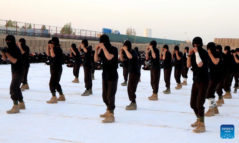 Police cadets show their skills during a graduation ceremony in Kandahar Province, Afghanistan, June 22, 2023. A total of 530 Afghans have completed a two-month training course in the National Police Academy of the southwestern region of Afghanistan and joined the national police. At the graduation ceremony held in the southern city of Kandahar on Thursday, the newly graduated policemen vowed to serve the people in the war-ravaged country.(Photo: Xinhua)