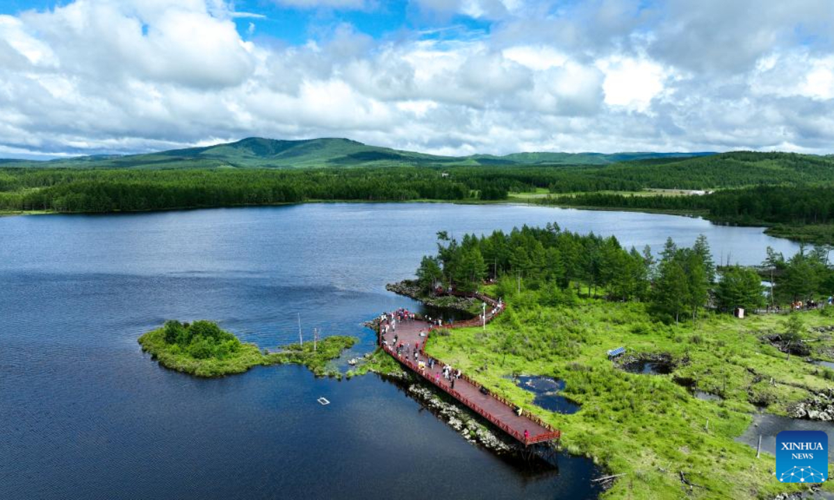 This aerial photo taken on July 6, 2023 shows tourists enjoying themselves at the Arxan National Forest Park in Arxan of Hinggan League, north China's Inner Mongolia Autonomous Region. Photo:Xinhua