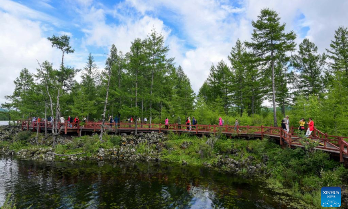 This aerial photo taken on July 6, 2023 shows tourists enjoying themselves at the Arxan National Forest Park in Arxan of Hinggan League, north China's Inner Mongolia Autonomous Region. Photo:Xinhua