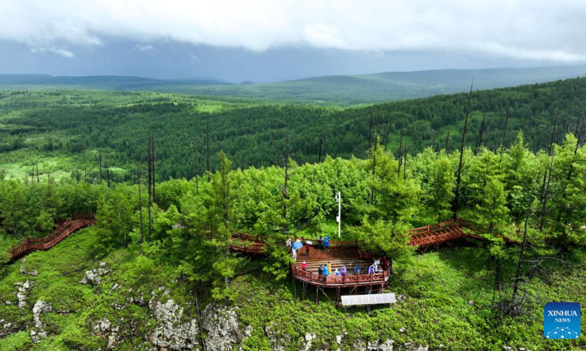 This aerial photo taken on July 6, 2023 shows tourists enjoying themselves at the Arxan National Forest Park in Arxan of Hinggan League, north China's Inner Mongolia Autonomous Region. Photo:Xinhua