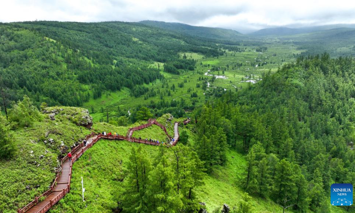 This aerial photo taken on July 6, 2023 shows tourists enjoying themselves at the Arxan National Forest Park in Arxan of Hinggan League, north China's Inner Mongolia Autonomous Region. Photo:Xinhua