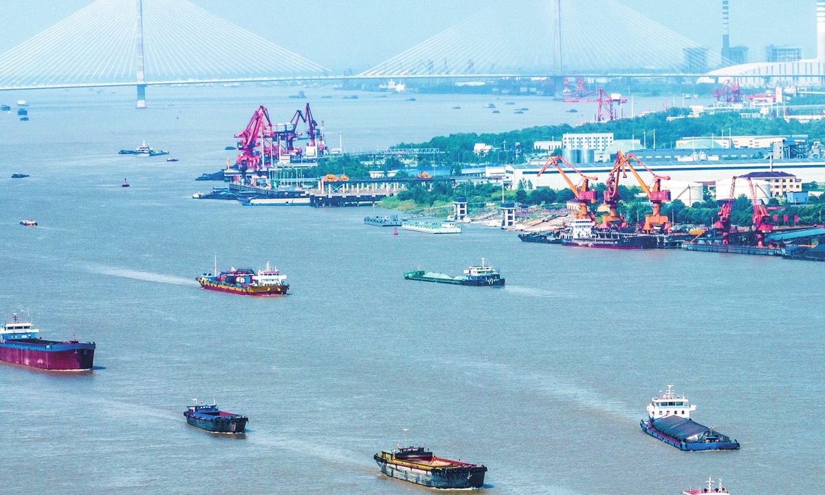 Cargo ships sail in the waters near Wuhu, East China's Anhui Province, on June 27, 2023. As the production demand gradually picks up, China's Yangtze River Delta, one of the country's economic hubs, is embracing a new wave of accelerated economic recovery. Photo: cnsphoto