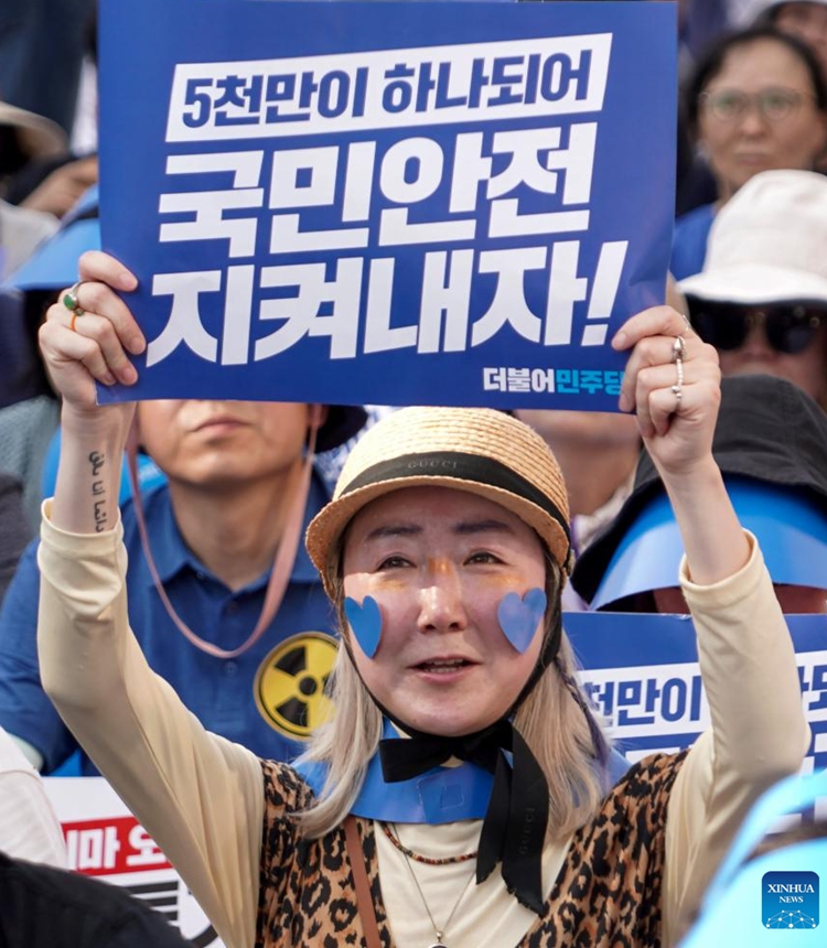 People take part in a rally to oppose Japan's nuclear-contaminated water discharge plan in Seoul, South Korea, July 1, 2023. South Korea's main opposition Democratic Party (DP) held a rally in central Seoul on Saturday to oppose Japan's nuclear-contaminated water discharge plan and urge the government to make clear its opposition to Japan's plan.  (Photo by James Lee/Xinhua)