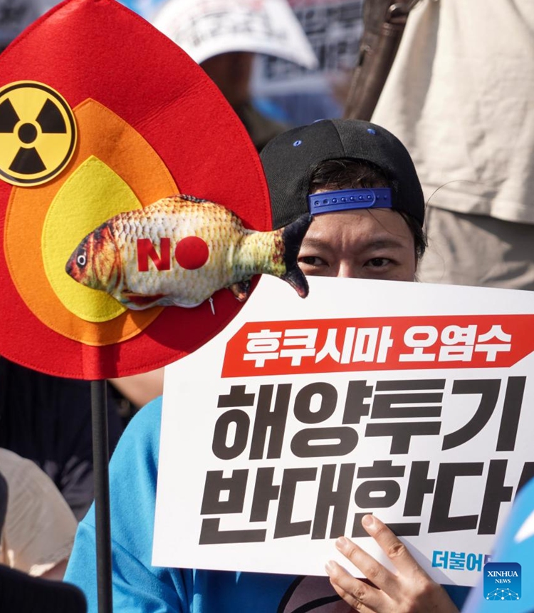 People take part in a rally to oppose Japan's nuclear-contaminated water discharge plan in Seoul, South Korea, July 1, 2023. South Korea's main opposition Democratic Party (DP) held a rally in central Seoul on Saturday to oppose Japan's nuclear-contaminated water discharge plan and urge the government to make clear its opposition to Japan's plan. (Photo by James Lee/Xinhua)