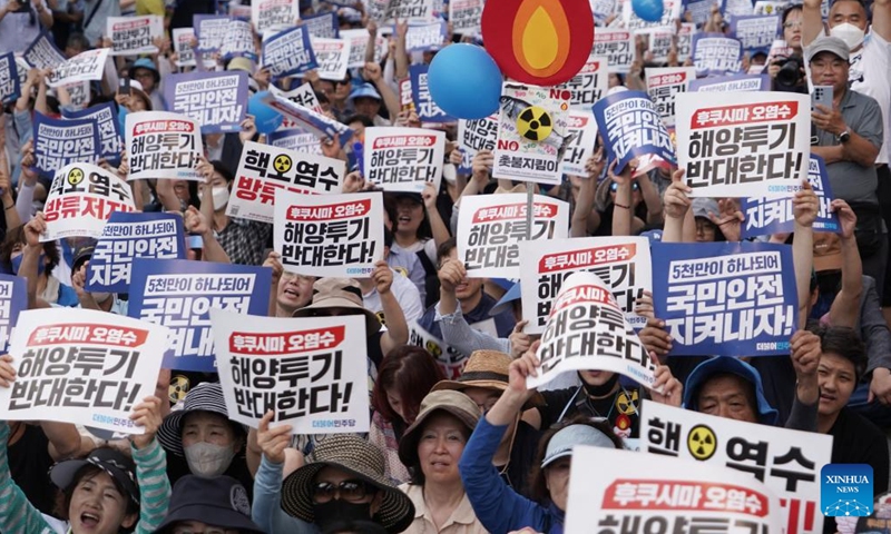 People take part in a rally to oppose Japan's nuclear-contaminated water discharge plan in Seoul, South Korea, July 1, 2023. South Korea's main opposition Democratic Party (DP) held a rally in central Seoul on Saturday to oppose Japan's nuclear-contaminated water discharge plan and urge the government to make clear its opposition to Japan's plan.  (Photo by James Lee/Xinhua)