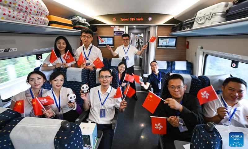 Passengers are seen on the high-speed train G2963 on July 1, 2023.

The train started on Saturday morning from Chengdu, the capital of southwest China's Sichuan Province, heading for Hong Kong.

It marked the opening of a direct high-speed train service between Chengdu and Hong Kong. (Xinhua/Wang Xi)