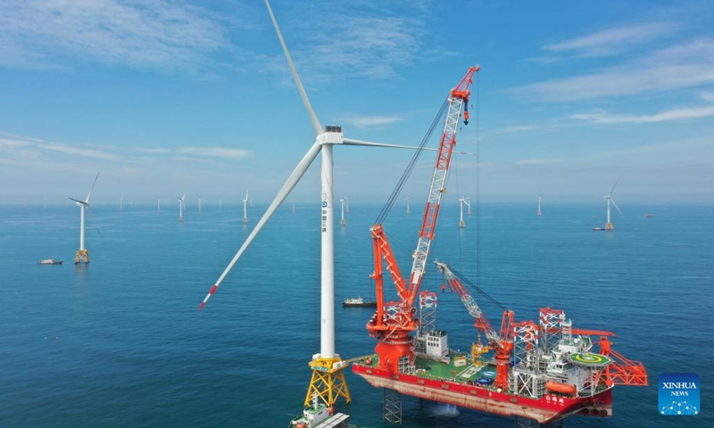 This aerial photo shows the construction site of the world's first 16-megawatt offshore wind turbine in Fuzhou, southeast China's Fujian Province, June 28, 2023. The construction of the giant offshore wind turbine, with the world's largest per-unit capacity, was completed here on Wednesday, according to China Three Gorges Corporation. (Photo:Xinhua)