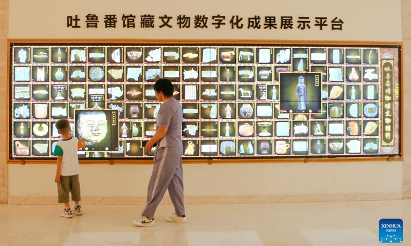 People visit the Turpan Museum in Turpan, northwest China's Xinjiang Uygur Autonomous Region, June 25, 2023. The city of Turpan has received 2.53 million tourist visits from June 1 to 28, an increase of nearly 40 percent over the same period in 2022. (Photo: Xinhua)