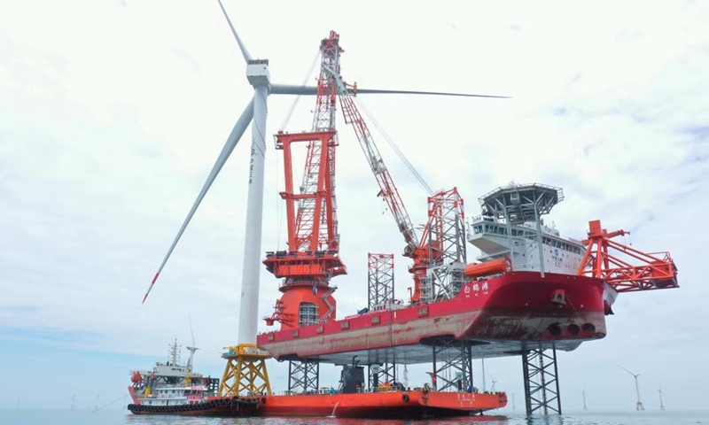 This aerial photo shows the construction site of the world's first 16-megawatt offshore wind turbine in Fuzhou, southeast China's Fujian Province, June 28, 2023. The construction of the giant offshore wind turbine, with the world's largest per-unit capacity, was completed here on Wednesday, according to China Three Gorges Corporation. (Photo:Xinhua)