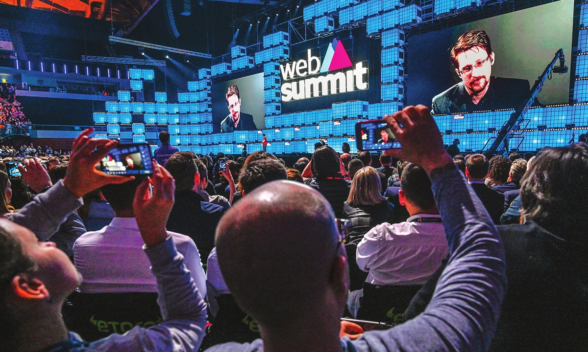 Edward Snowden is seen onscreen while speaking from Russia to the audience during an interview on November 4, 2019 in Lisbon, Portugal. Photo: VCG